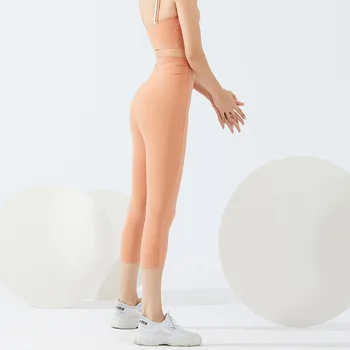 Nové letné nahé fitness nohavice dámske vysoký pás športové tesný ostrihané nohavice vonkajšie nosenie beží broskyňa hip výťah jóga nohavice